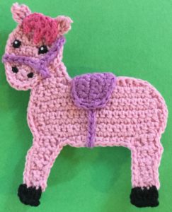 Crochet rocking horse body with saddle