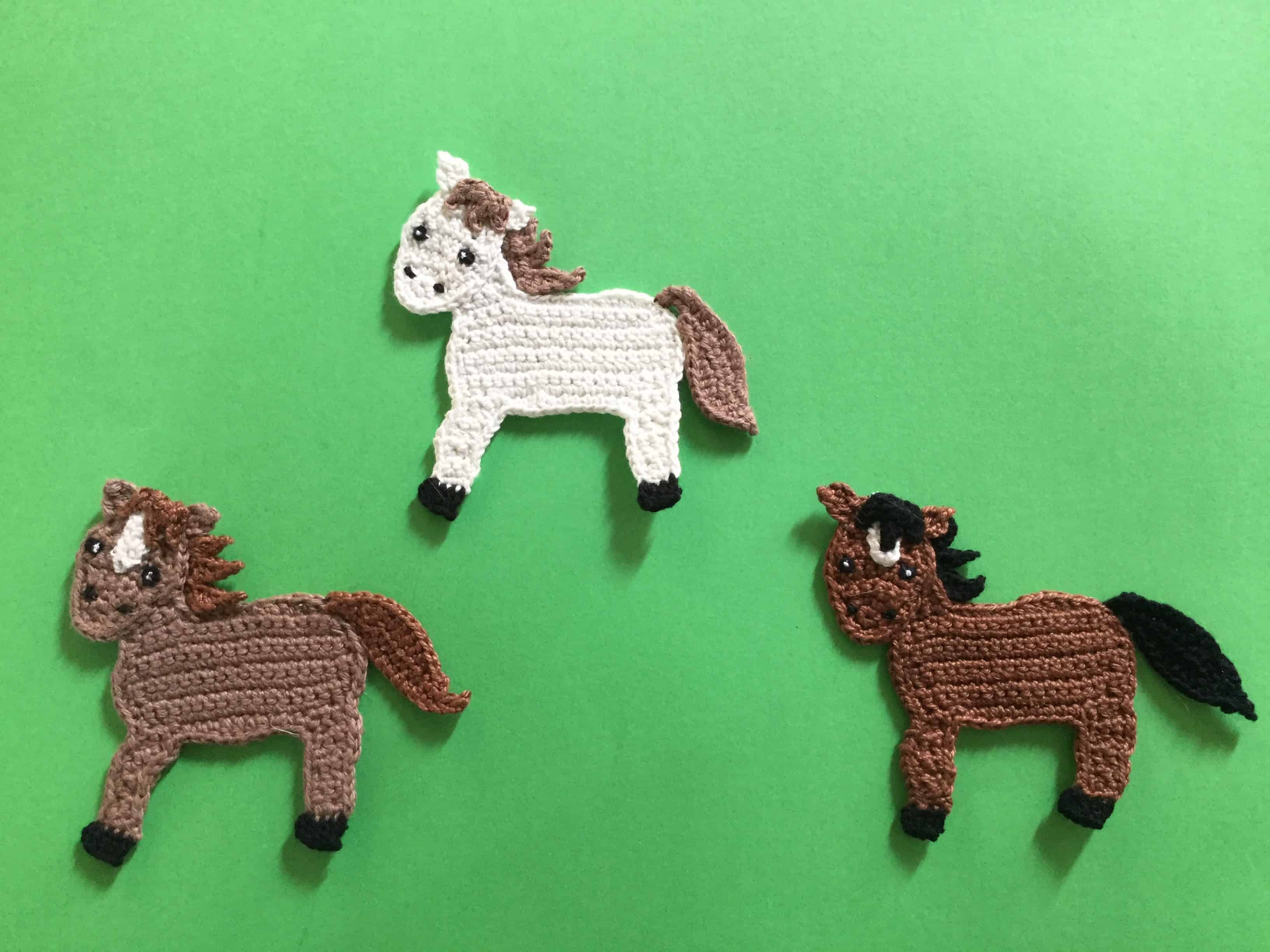 Finished crochet horse group landscape