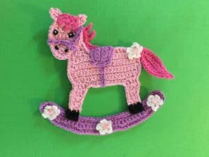 Finished crochet rocking horse landscape