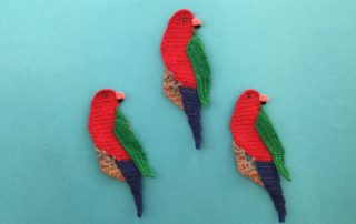 Finished crochet king parrot group landscape