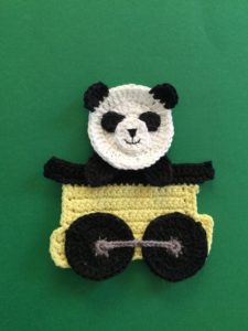 Finished crochet panda head portrait