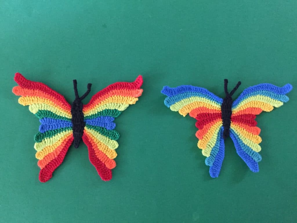 Finished crochet butterfly green background group landscape