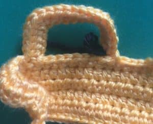 Crochet digger steering wheel loop