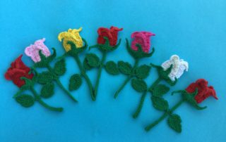 Finished crochet rosebud group landscape