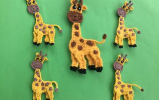 Finished crochet giraffe group landscape