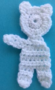 Crochet teddy for plane mobile body with first arm