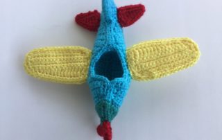 Finished crochet plane mobile landscape