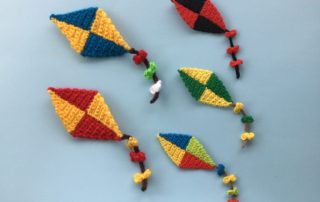 Finished crochet kite group landscape