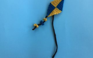 Finished crochet kite landscape