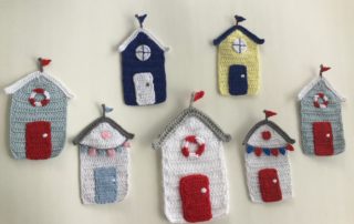 Finished crochet beach huts group landscape