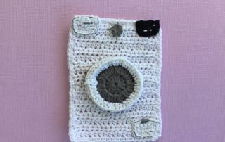 Finished crochet washing machine landscape