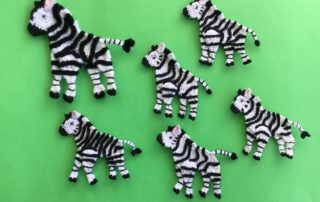 Finished crochet zebra group landscape