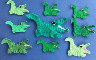 Finished crochet crocodile 2 ply group landscape