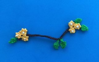 Finished crochet branch 2 ply branch with yellow flowers landscape