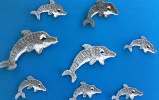 Finished crochet dolphin 2 ply group landscape