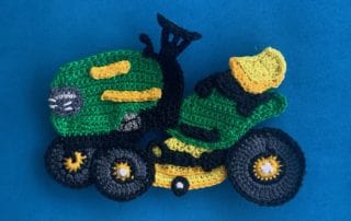 Finished crochet ride on mower 2 ply landscape