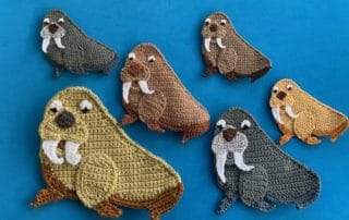 Finished crochet walrus 2 ply group landscape