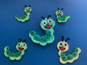 Finished crochet caterpillar 2 ply group landscape