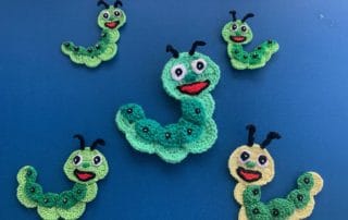Finished crochet caterpillar 2 ply group landscape