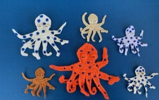 Finished crochet octopus 2 ply group landscape