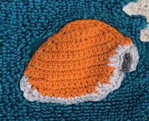 Crochet sea towel golden cowrie