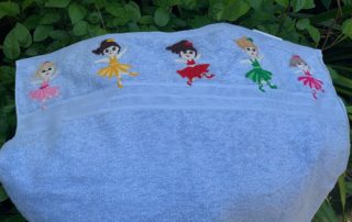 Finished crochet ballerina towel landscape