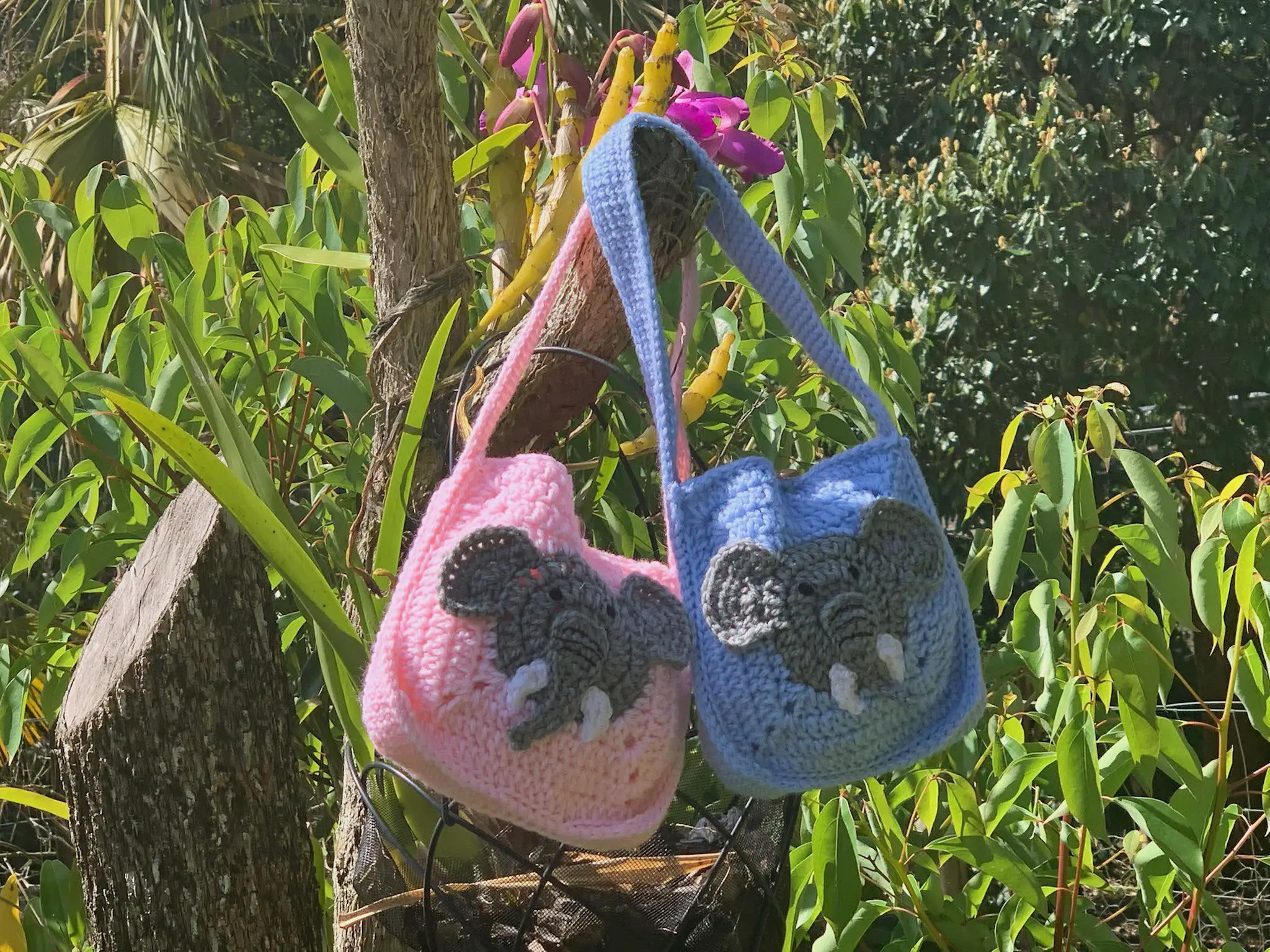 Finished crochet elephant bag outside landscape