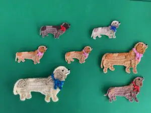 Finished crochet sausage dog 2 ply group landscape