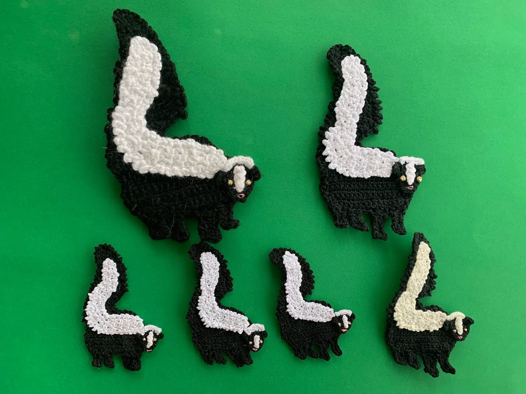 Finished crochet skunk 2 ply group landscape