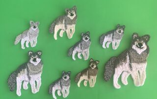 Finished crochet wolf 2 ply group landscape