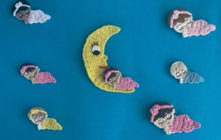 Finished crochet sleeping baby 2 ply group landscape