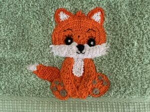 Finished crochet woodland animal towel fox