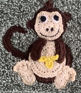 Crochet jungle towel monkey