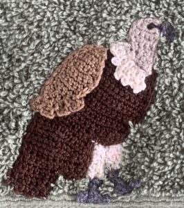 Crochet jungle towel vulture