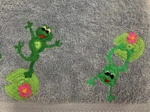 Crochet frog towel closeup frogs 1