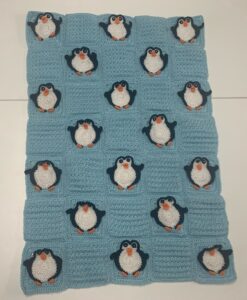 Crochet penguin baby blanket joined