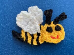 Finished crochet small bee tutorial 4 ply landscape