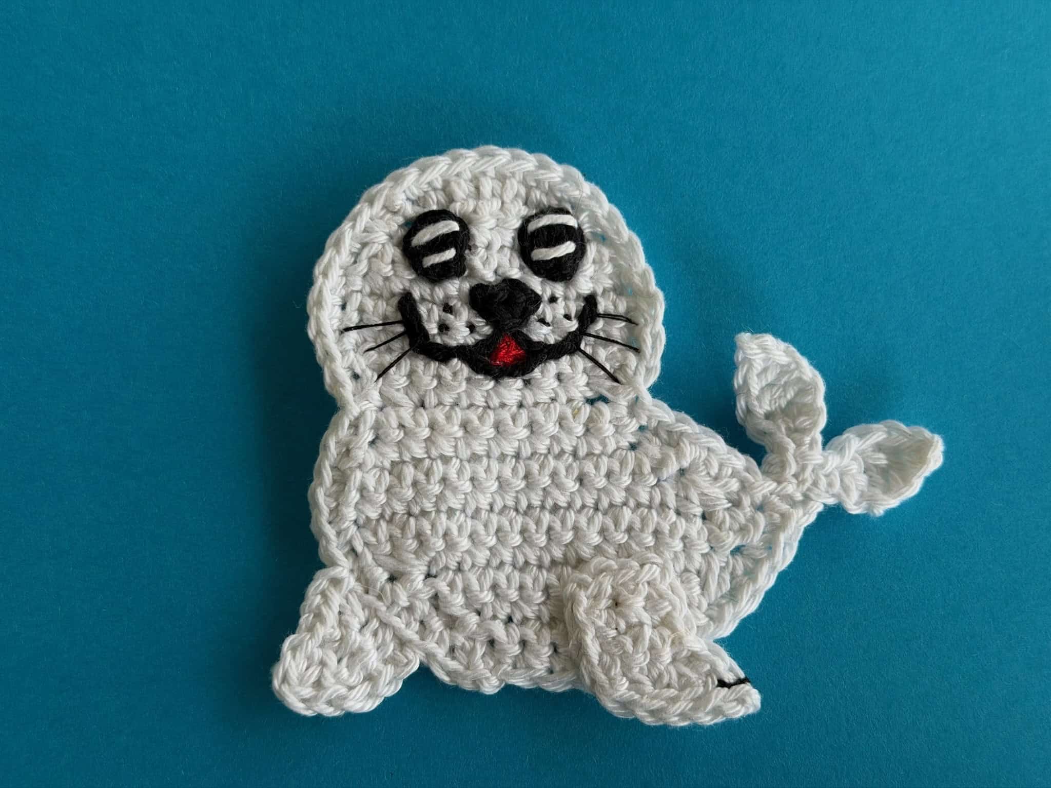 Finished crochet baby seal 4 ply landscape
