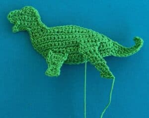Crochet dinosaur stegosaurus 2 ply near back leg