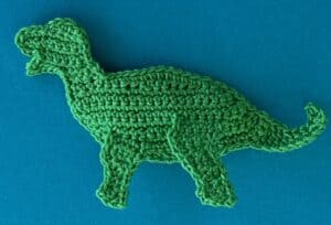 Crochet dinosaur stegosaurus 2 ply near back leg neatened