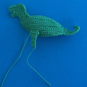 Crochet dinosaur stegosaurus 2 ply near front leg