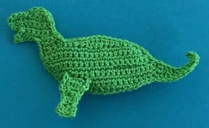 Crochet dinosaur stegosaurus 2 ply near front leg neatened