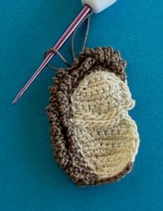 Crochet sitting hedgehog 2 ply joining for spikes row 3