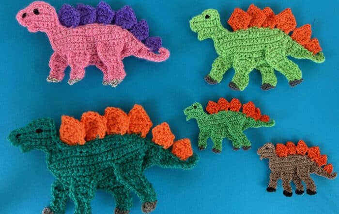 Finished crochet dinosaur stegosaurus 2 ply group landscape