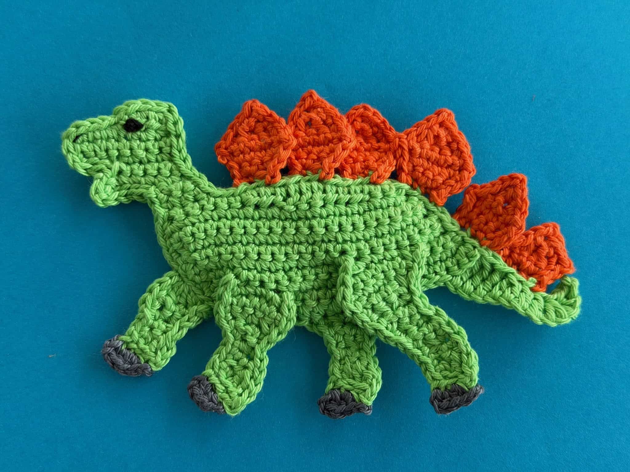 Finished crochet dinosaur stegosaurus 4 ply landscape