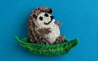 Finished crochet sitting hedgehog 2 ply landscape